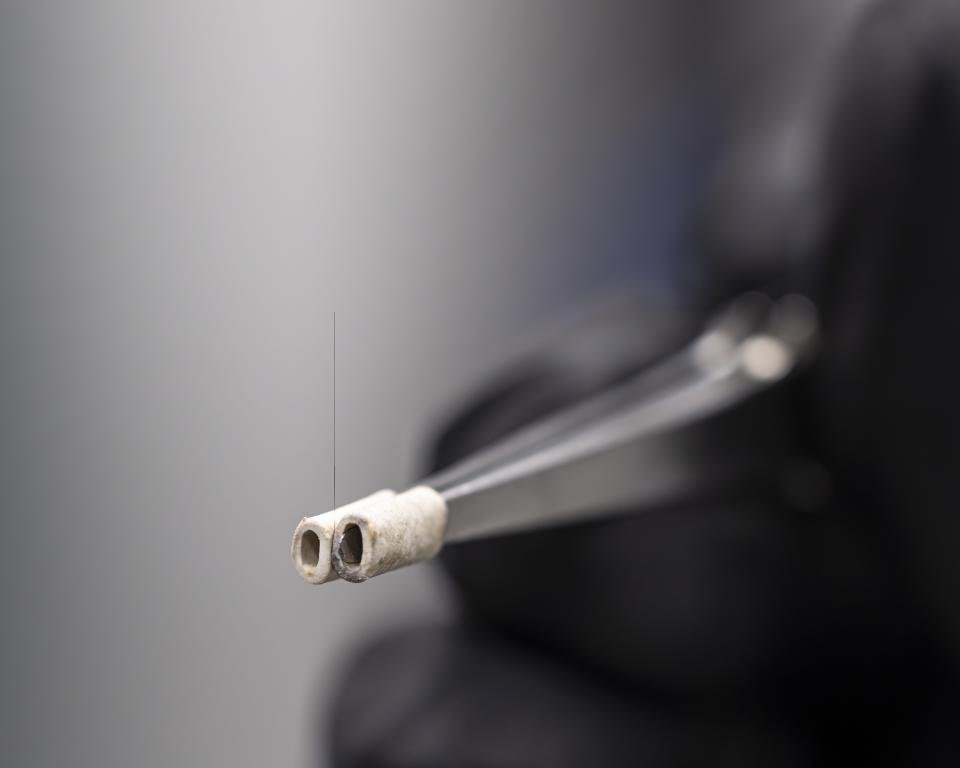 Nanofibers yield stronger, tougher carbon fiber composites